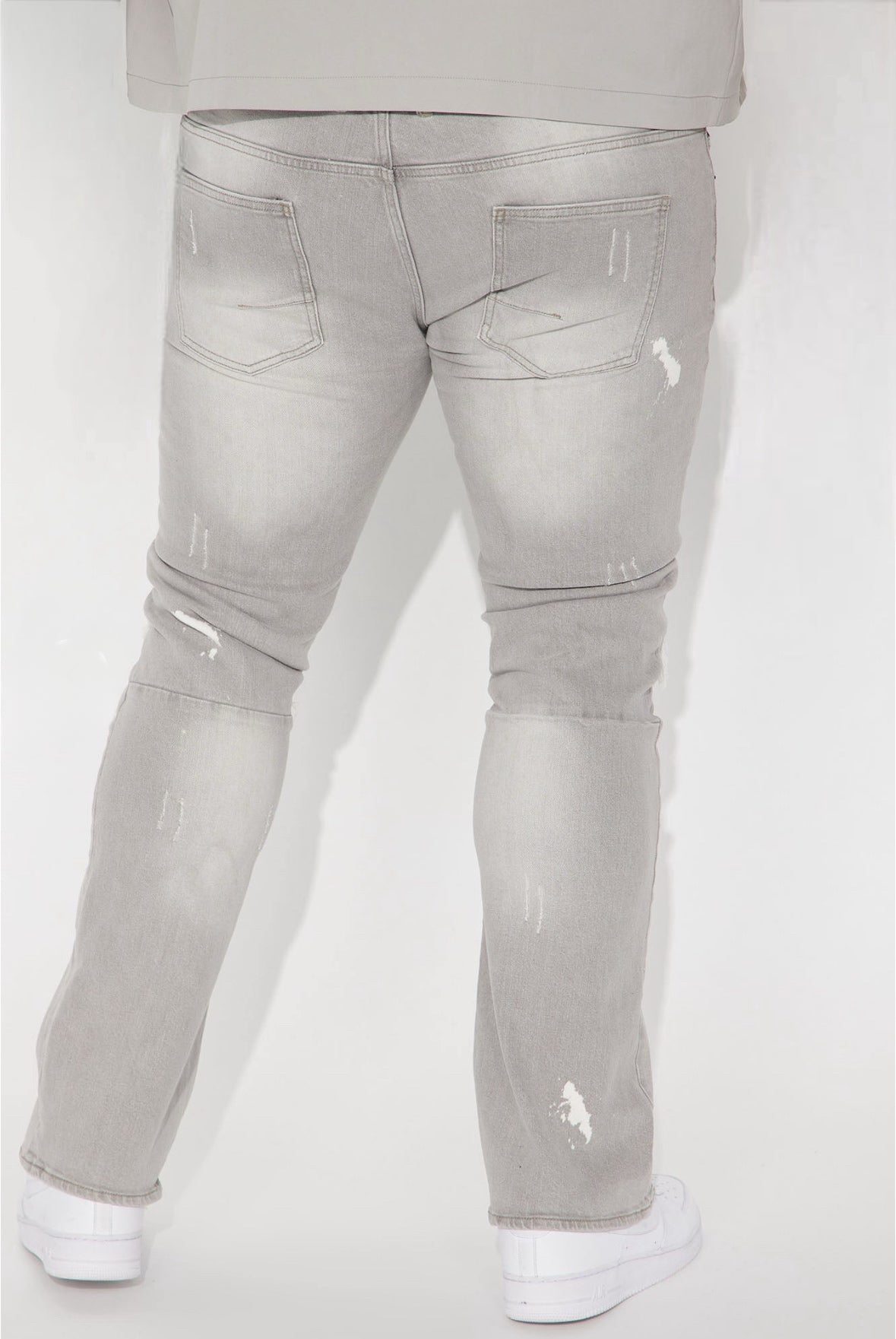 Men’s gray distressed skinny stacked jeans